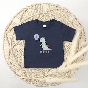 Kundenspezifisches Jungen-Dinosaurier-erster Geburtstags-T-Stück 1. Geburtstag Outfit T-Rex Geburtstags-Jungen-Shirt Dino-Thema Personalisiertes erstes Geburtstags-Mädchen-Party-Shirt