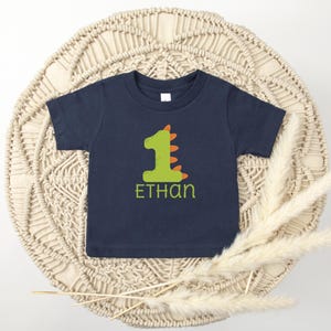 Kundenspezifisches Jungen-Dinosaurier-erster Geburtstags-T-Stück 1. Geburtstag Outfit T-Rex Geburtstags-Jungen-Shirt Dino-Thema Personalisiertes erstes Geburtstags-Mädchen-Party-Shirt