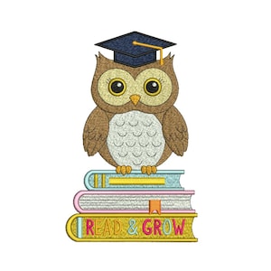 May include: An embroidered design featuring a brown owl in a graduation cap, sitting on a pile of books. The bottom book displays the text "READ & GROW" in gold. The owl has large yellow eyes.