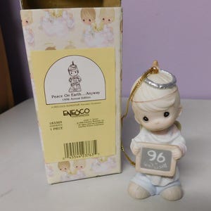 Precious Moments "Peace on Earth...Anyway" figurine