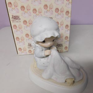 Precious Moments &quot;Love Covers All&quot; figurine