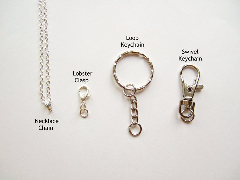 May include: Three different types of metal chains: a necklace chain with a lobster clasp, a loop keychain, and a swivel keychain.