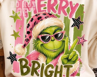 T-shirt de Noël rétro rayé et amusant avec un personnage vert, style Grinchy, vintage et preppy, pour les fêtes d'hiver. Design par sublimation.