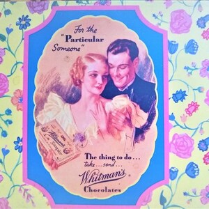 May include: A vintage Whitman's Chocolates tin with a floral pattern. The tin features a couple in a romantic setting with the text "For the "Particular" Someone" and "The thing to do... take...send... Whitman's Chocolates".