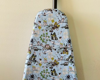 Ironing Board Cover gumnuts, babies with bugs spiders and butterflies on a sky blue background