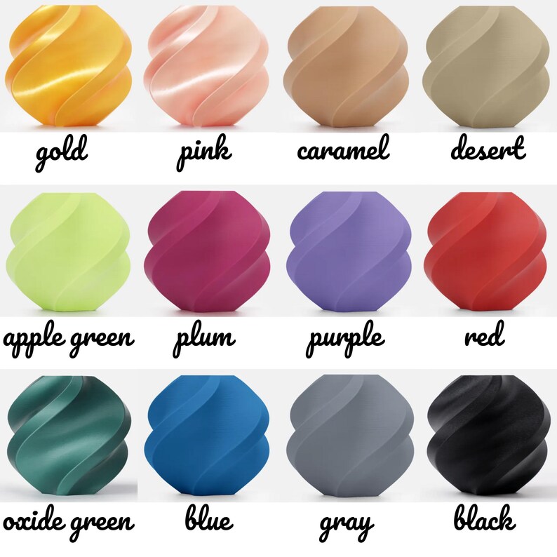 May include: A collection of twelve decorative, spiral-shaped objects in various colors, including gold, pink, caramel, desert, apple green, plum, purple, red, oxide green, blue, gray, and black. Each object has a smooth, curved design with the color name written below.