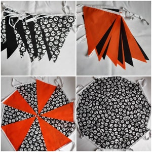 May include: A collection of Halloween-themed pennant banners. Some are black with white skull and crossbones patterns, others are solid orange or black. The banners are strung together with white ribbon, suitable for festive decorations.