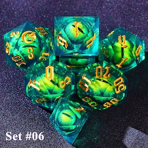 May include: A set of six polyhedral dice with a fantasy theme. The dice are transparent teal with gold numbering and a green eye design inside. The text "Set #06" is at the bottom.