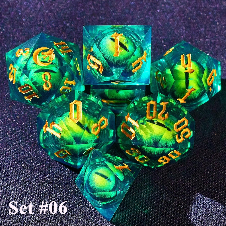 May include: A set of six polyhedral dice with a fantasy theme. The dice are transparent teal with gold numbering and a green eye design inside. The text "Set #06" is at the bottom.