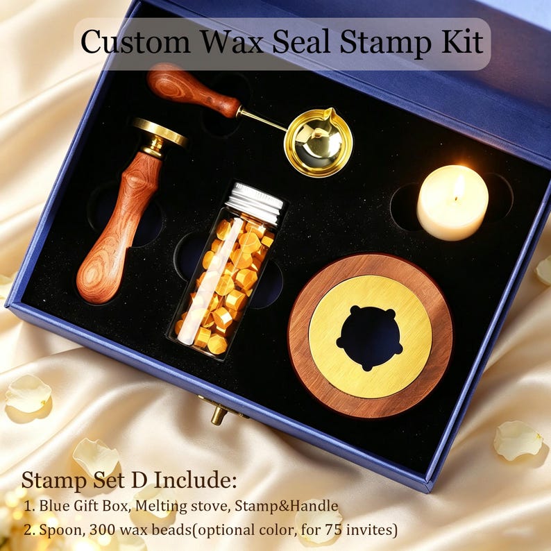 May include: A Custom Wax Seal Stamp Kit in a blue box containing a wooden-handled stamp, a gold-toned melting spoon, a glass vial of yellow wax beads, a wooden melting stove, and a white tea light candle. Text reads Custom Wax Seal Stamp Kit.