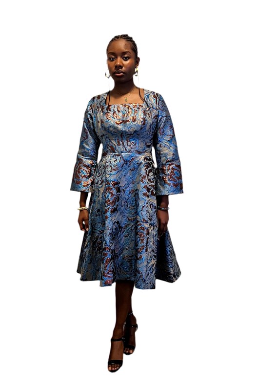 green emerald velvet dress Jewel neck detail long sleeve midi length A-line brocade gown  John Paul  Ataker