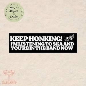 May include: A black magnet or sticker with white text that reads "KEEP HONKING! I'M LISTENING TO SKA AND YOU'RE IN THE BAND NOW." The magnet is 10" x 3" and features a trumpet graphic. A circular sticker with text is in the upper left corner.