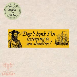 May include: A yellow magnet or sticker with the text "Don't honk I'm listening to sea shanties!" features a pirate illustration and a ship. The magnet measures 10" x 3".