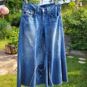 Kreolka True Religion tattered and torn denim skirt, patchwork, pockets, frayed, distressed by time, worn out, artfully destroyed, long