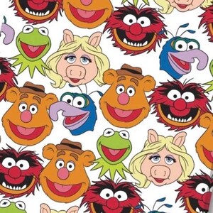May include: A repeating pattern on a white background featuring the faces of Muppet characters including the green frog Kermit, the blonde pig Miss Piggy, the orange bear Fozzie, the red-haired Animal, and the blue-skinned Gonzo with a long nose.