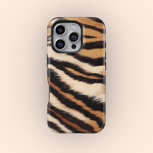 May include: A smartphone case featuring a tiger stripe pattern in shades of brown, black, and cream. The case has a glossy finish and a camera cutout.