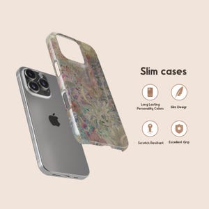May include: A silver iPhone with a floral patterned slim case. The case features a design with pink, green, and beige tones. The text "Slim cases" is displayed with icons indicating features like "Long Lasting Personality Colors" and "Scratch Resistant".