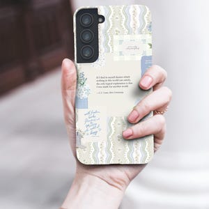 May include: A white phone case with a floral pattern and a quote by C.S. Lewis: "If I find in myself desires which nothing in this world can satisfy, the only logical explanation is that I was made for another world." -C.S. Lewis, Mere Christianity