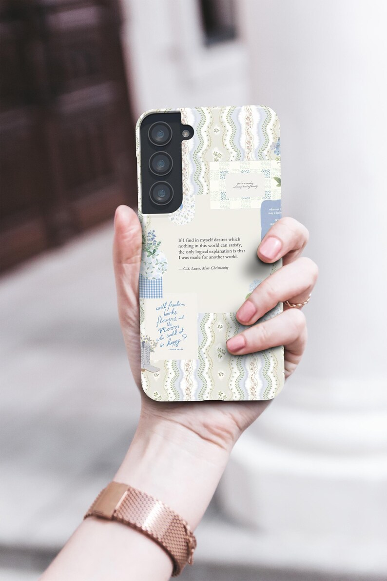 May include: A white phone case with a floral pattern and a quote by C.S. Lewis: "If I find in myself desires which nothing in this world can satisfy, the only logical explanation is that I was made for another world." -C.S. Lewis, Mere Christianity
