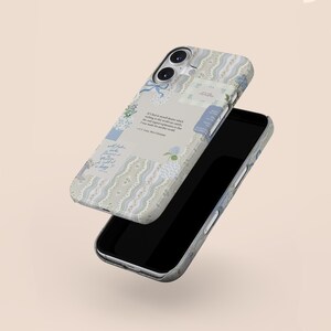 May include: A white and blue patterned phone case with a quote about finding strength in a world that can be overwhelming. The quote reads "If I find in myself desires which nothing in this world can satisfy, the very nature of these desires tells me that I was made for another world." - C.S. Lewis.