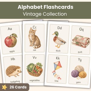 May include: A set of alphabet flashcards from a vintage collection featuring 26 cards. Each card displays an uppercase and lowercase letter, a detailed illustration, and the corresponding word, including apple, cat, duck, quilt, hedgehog, vegetables, kite, and yarn.