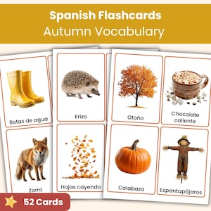 May include: A set of Spanish flashcards titled Autumn Vocabulary featuring 52 cards. Each card displays a colourful image and a corresponding Spanish word, including yellow rain boots, a hedgehog, an autumn tree, hot chocolate, a fox, falling leaves, a pumpkin, and a scarecrow.
