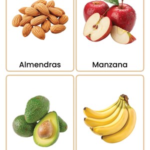 May include: Four flashcards displaying food items. The top left card shows a pile of almonds, the top right card shows red apples, one sliced. The bottom left card shows avocados, and the bottom right card shows bananas. Each card has a food name in Spanish.