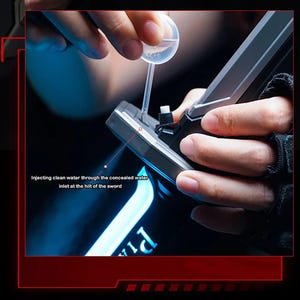 May include: A close-up of a black and gray sword being filled with water. The text on the image reads, "Injecting clean water through the concealed water inlet at the hilt of the sword."