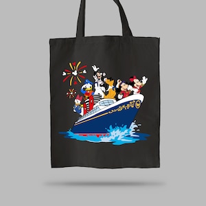 May include: A black tote bag with a colorful illustration of Mickey Mouse, Minnie Mouse, Donald Duck, Goofy, and Pluto on a blue and white cruise ship. The characters are waving and smiling. There are fireworks in the background.