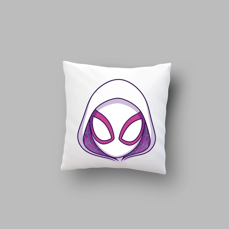 May include: A square white throw pillow featuring a centered graphic illustration of a masked character head wearing a hood. The mask is white with pink-outlined eye lenses and a purple interior hood lining decorated with a blue spiderweb pattern.