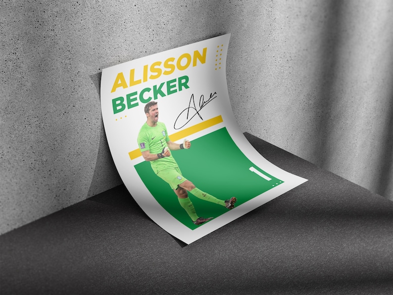 May include: A poster featuring soccer player Alisson Becker in a green uniform, with his name in yellow and green text. The poster includes his signature and a green and yellow design.