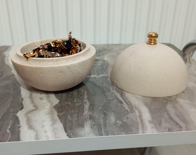 I present to you the elegant natural travertine sphere sugar bowl.