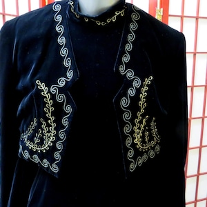 May include: A set of three ceramic mugs with a speckled, matte finish. The mugs are in shades of cream, light gray, and dark gray. Each mug has a simple, modern design, perfect for coffee or tea.