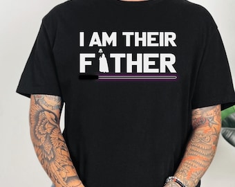 May include: Black t-shirt with the text "I am their father" and a silhouette of Darth Vader. The text is in white and the silhouette is in white with a purple lightsaber.