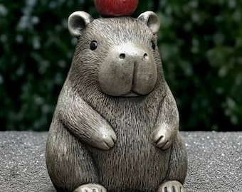 Kapybara med äpplestaty Söt kapybaraskulptur Rolig djurfigur Utomhusträdgårdsdekoration Gräsmatta ornament Djurvänlig present