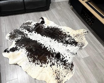 Genuine Black & White Spotted Cowhide Rug: Natural, Luxurious