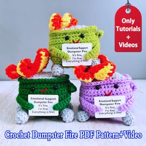 May include: Three crocheted dumpster fire figures in green, purple, and green, each with a flame and a sign that reads "Emotional Support Dumpster Fire. It's fine, I'm fine. Everything is fine!" A red tag says "Only Tutorials + Videos".