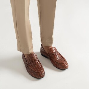 Handcrafted woven leather penny loafers for men in rich brown color featuring luxury braided texture, comfortable slip-on construction, elegant formal shoe styling, Italian-inspired moccasin design, and premium men’s wedding and office footwear by TheHideNStyle.