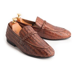 Handwoven brown leather penny loafers for men featuring luxury braided weave design, Italian-inspired slip-on dress shoes, premium artisan craftsmanship, lightweight formal loafers, woven leather moccasins, and stylish men’s wedding shoes by TheHideNStyle.