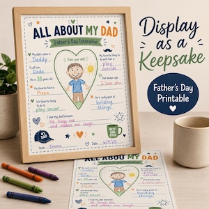 A framed Father's Day interview printable with the text "All About My Dad." The design includes space to fill in details like Dad's name, age, favourite food, and activities. The frame is light brown, and the printable is on white paper.