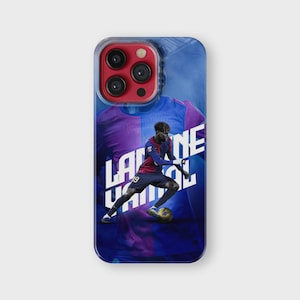 May include: A clear phone case featuring a soccer player in a red and blue uniform, with the text "Lamine Yamal" in white. The background is a gradient of blue and purple.