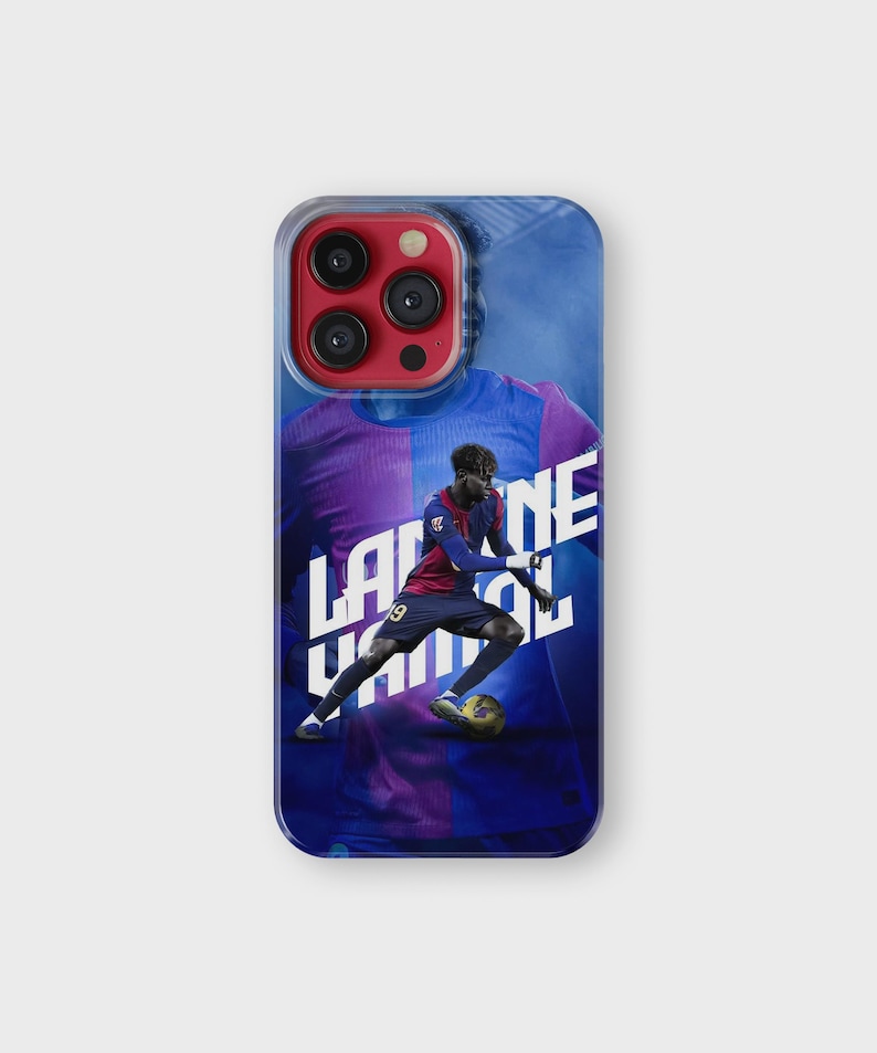 May include: A clear phone case featuring a soccer player in a red and blue uniform, with the text "Lamine Yamal" in white. The background is a gradient of blue and purple.