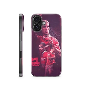 以下が含まれることがあります： 赤、白、黒の携帯電話ケースで、3人のサッカー選手の画像がプリントされています。選手は赤と白のユニフォームを着ています。ケースには「21」と「TONY」の文字が見えます。