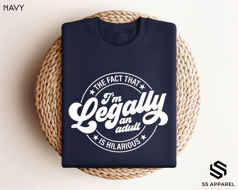 a navy t - shirt that says i'm legally an actual