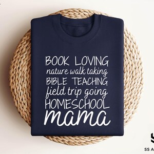 a t - shirt that reads book loving nature walking bible teaching field trip going home