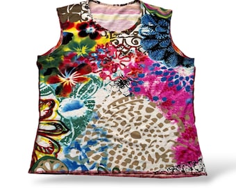 May include: A sleeveless top with a vibrant patchwork design. The top features a mix of floral and abstract patterns in a variety of colors, including red, blue, pink, and green. The edges are trimmed with a red border.