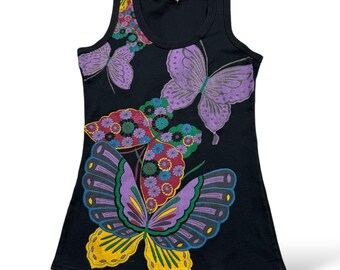 May include: Black tank top with a vibrant butterfly design. The butterflies feature purple, yellow, and green wings with intricate patterns. The tank top has a scoop neckline and a ribbed texture.