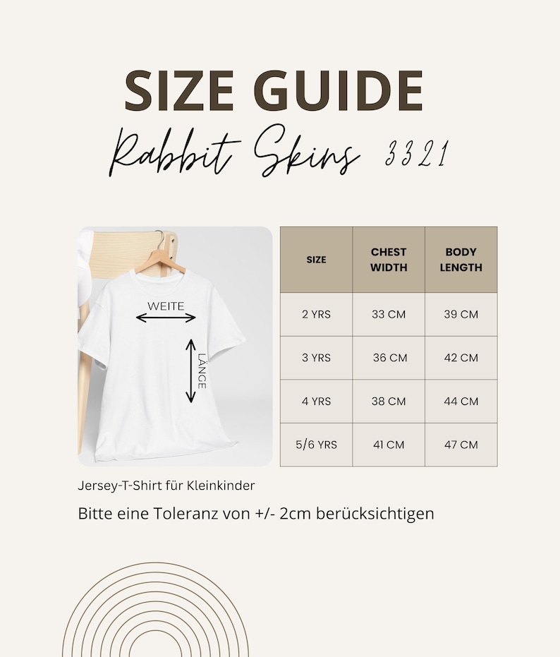 May include: A size guide for Rabbit Skins 3321 t-shirts. The guide shows chest width and body length measurements in centimeters for sizes 2 YRS to 5/6 YRS. The text on the shirt reads "WEITE" and "L&Auml;NGE".