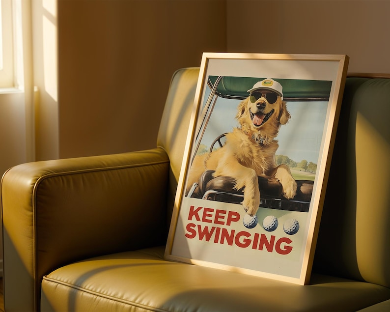 May include: A framed poster featuring a golden retriever wearing a golf cap and sunglasses, sitting in a golf cart. The poster has the text "Keep Swinging" in red and white letters.