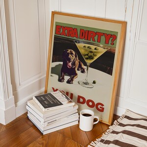 May include: A framed poster with a brown dog and a martini glass with olives. The poster says "Extra Dirty? You Dog".